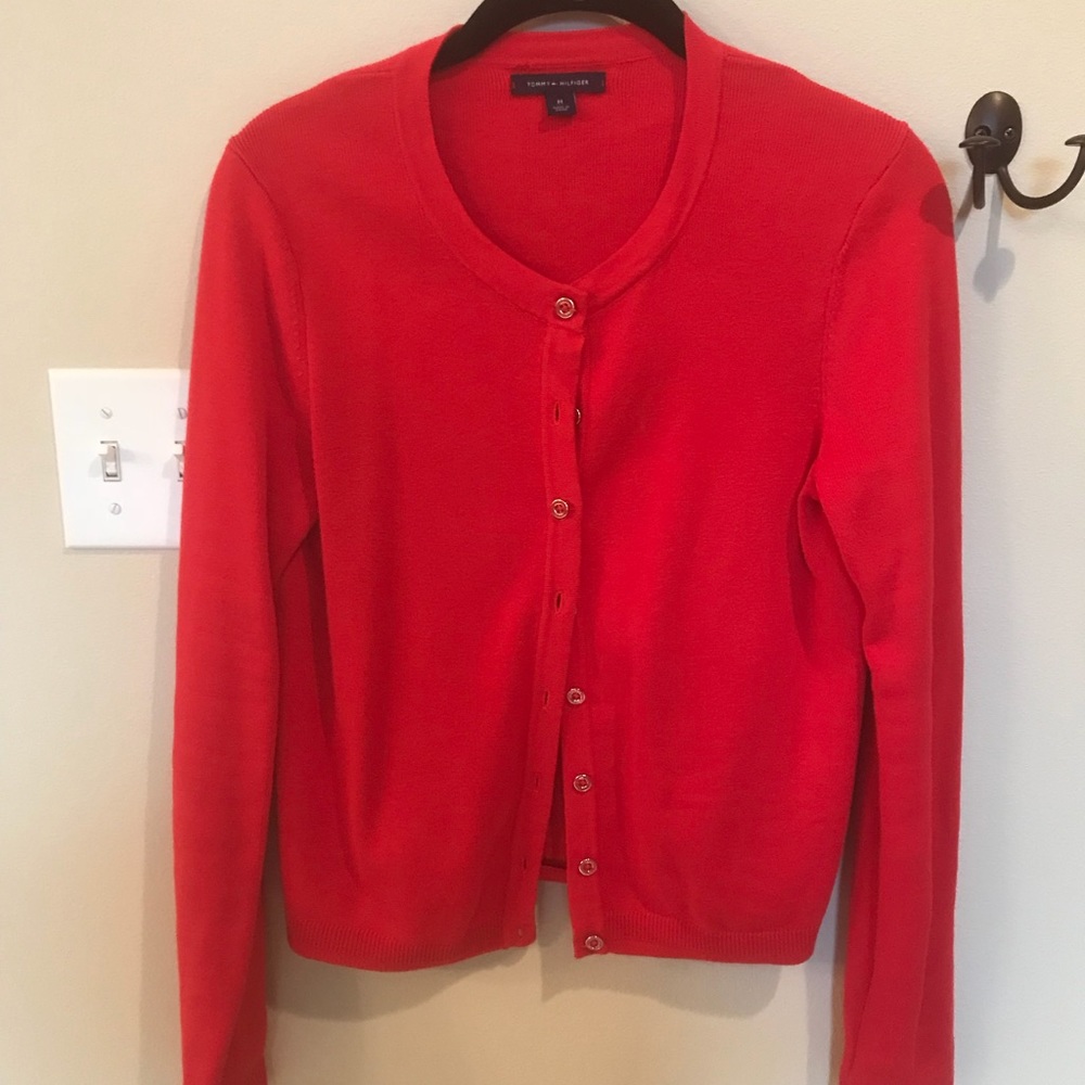 Cute red cardigan.